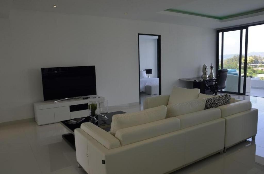 Sansuri Resort Сурин Бийч Екстериор снимка