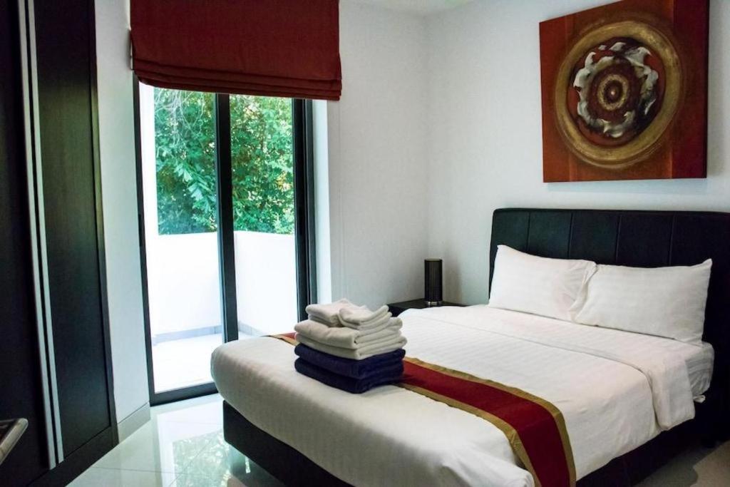 Sansuri Resort Сурин Бийч Екстериор снимка