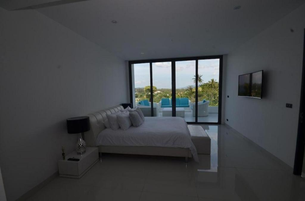Sansuri Resort Сурин Бийч Екстериор снимка