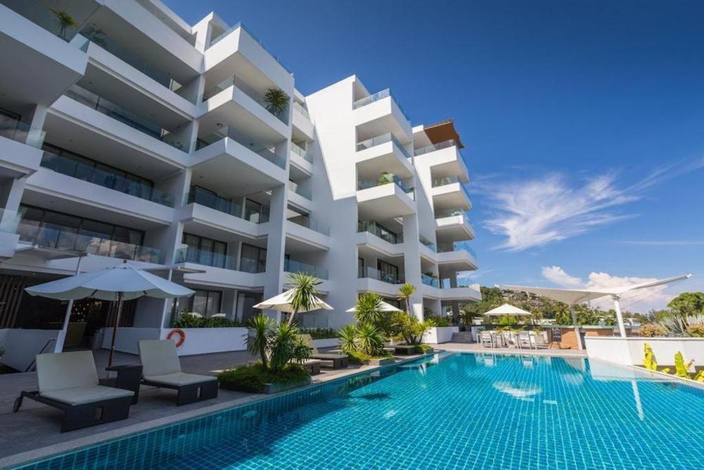 Sansuri Resort Сурин Бийч Екстериор снимка