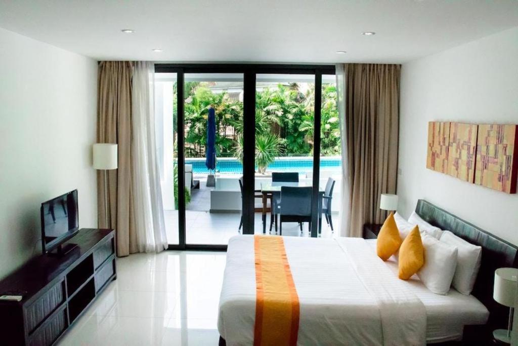 Sansuri Resort Сурин Бийч Екстериор снимка