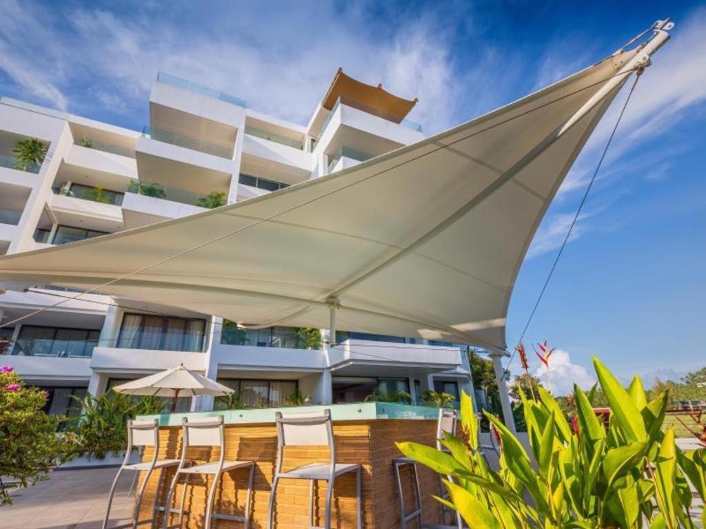 Sansuri Resort Сурин Бийч Екстериор снимка