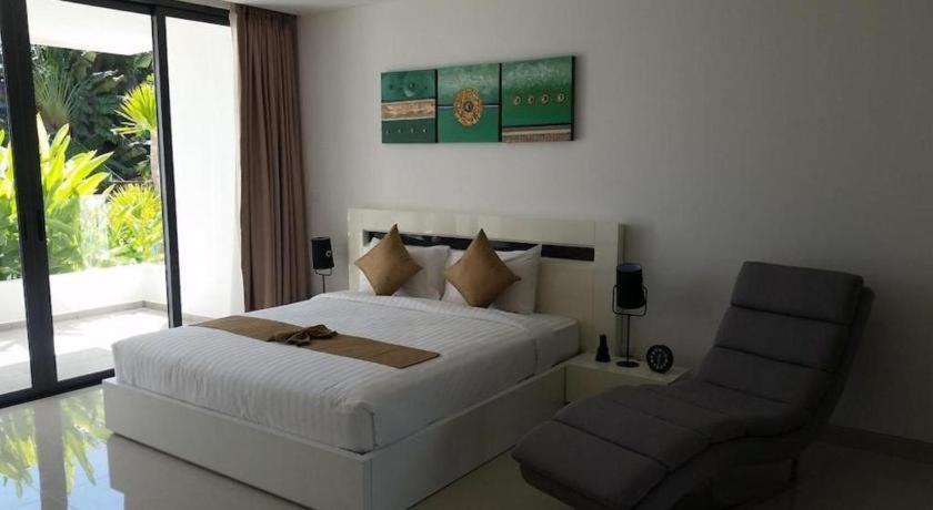 Sansuri Resort Сурин Бийч Екстериор снимка