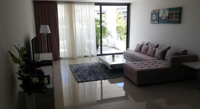 Sansuri Resort Сурин Бийч Екстериор снимка