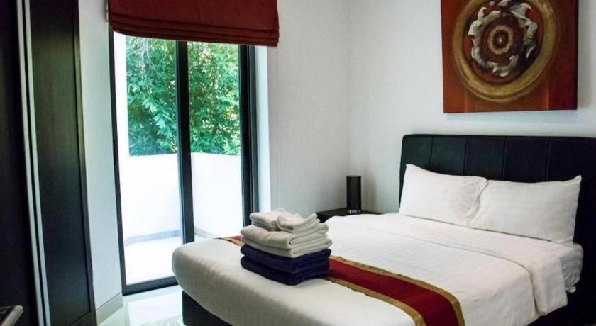 Sansuri Resort Сурин Бийч Екстериор снимка